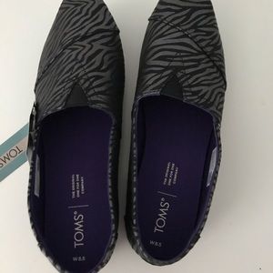 Woman’s Toms Black Zebra Shimmer Print Shoes